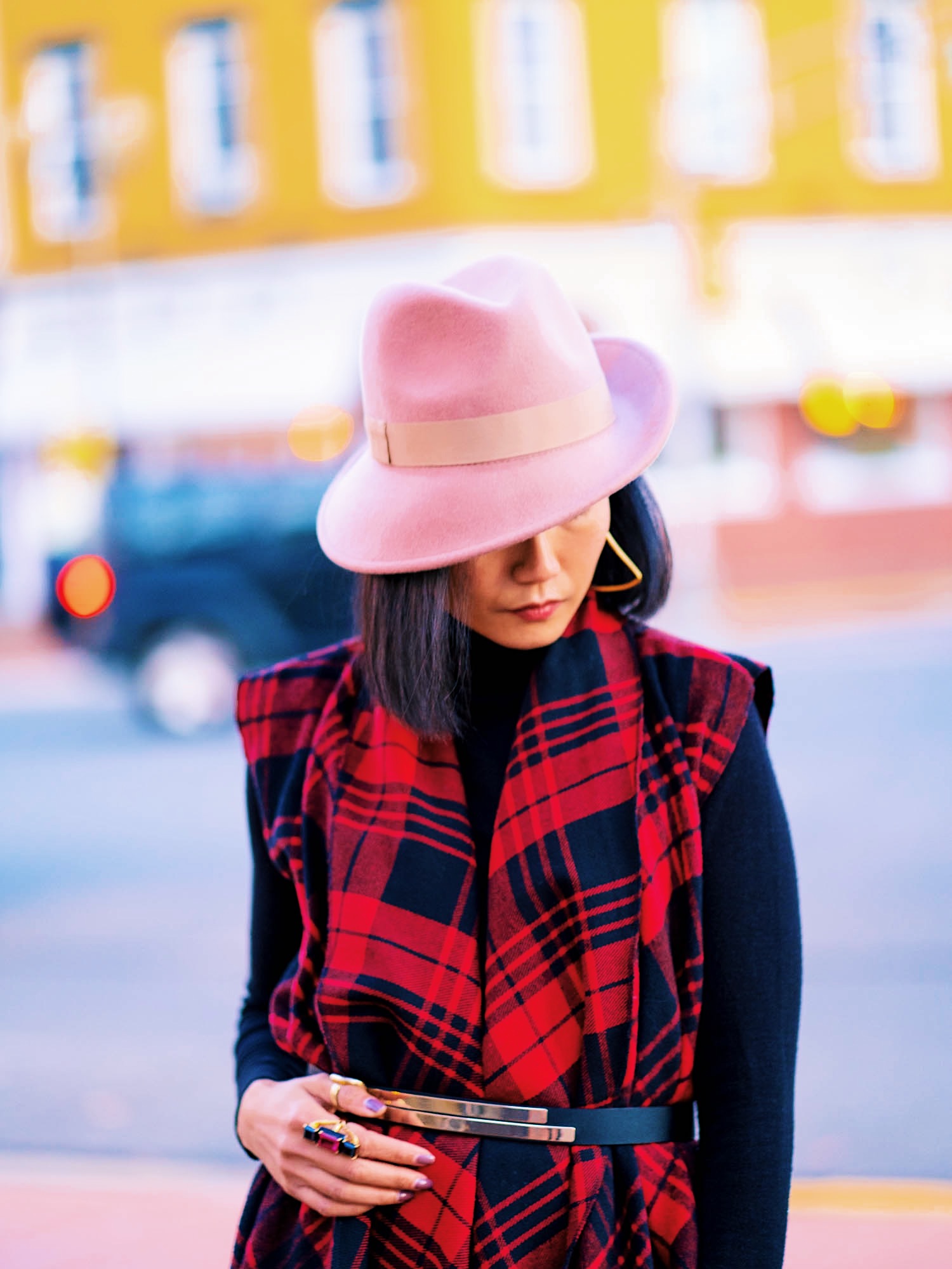 portrait shot with a pink fedora hat by grace hats