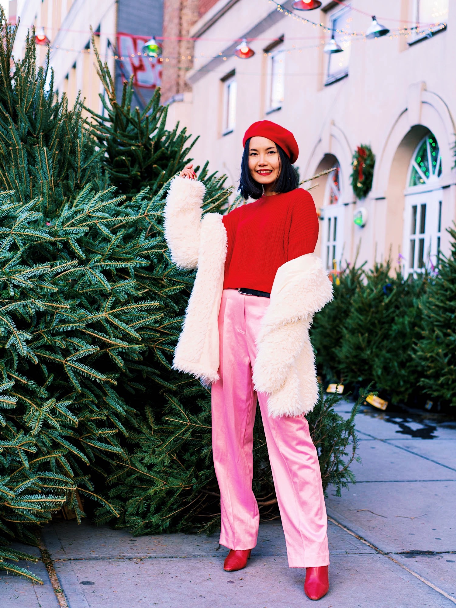 holiday party outfit idea casual style 2019 with comfy red sweater pink pants red booties and red beret