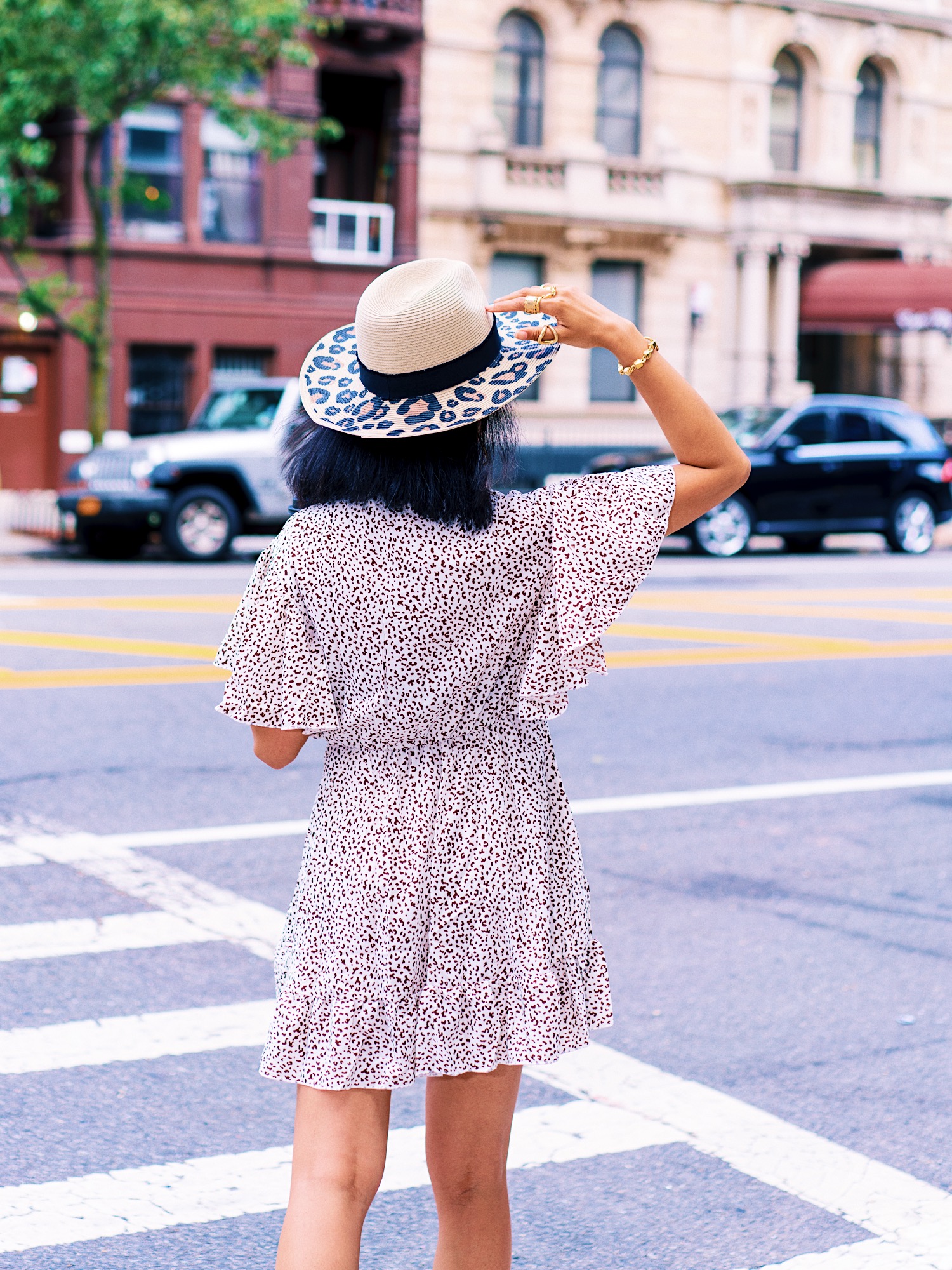 nanphanita is wearing SDHC womens printed animal print brim fedora hat for summer stroll in manhattan