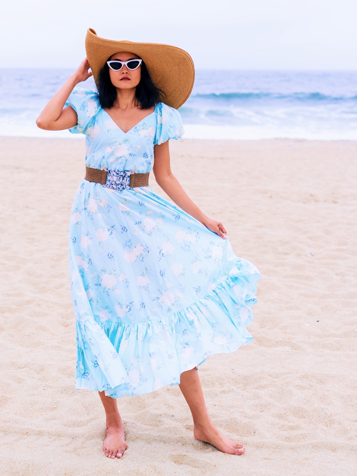 nanphanita is wearing womes ultrabraid side tack fold sun hat by san diego hat company at asbury park beach