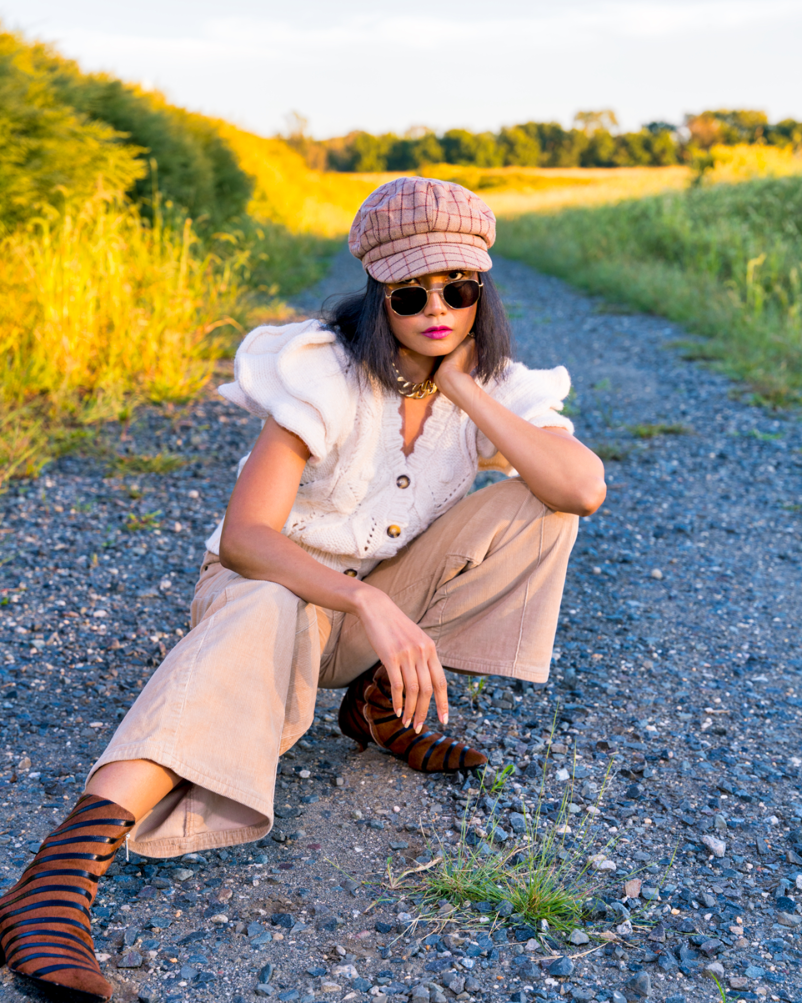 nanphanita jacob is wearing a panel plaid baker boy cap with 70s fashion by san diego hat company reference number cth1814