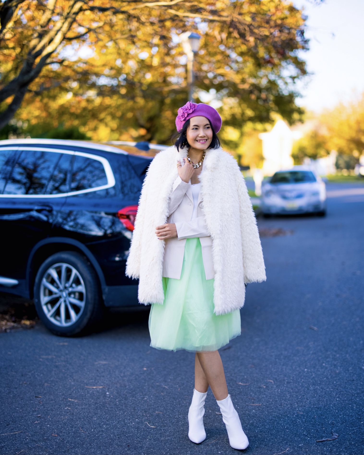 nanphanita is channeling carrie bradshaw in sex and the city with a green tulle dress and womens wool beret with flowers by san diego hat company