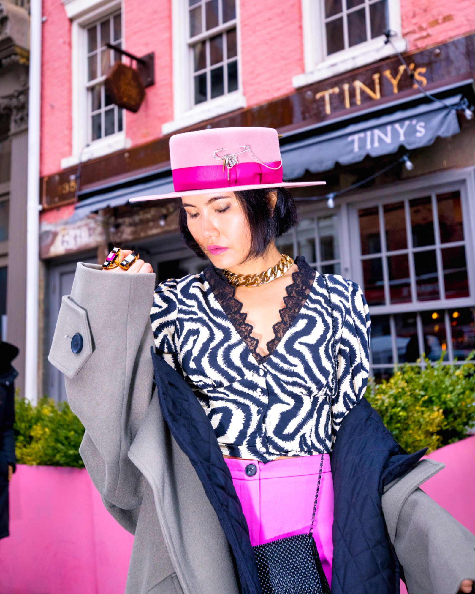 nanphanita jacob is wearing a pink cordobés hat by gladys tamez millinery for valentines day outfit idea in tribeca nyc