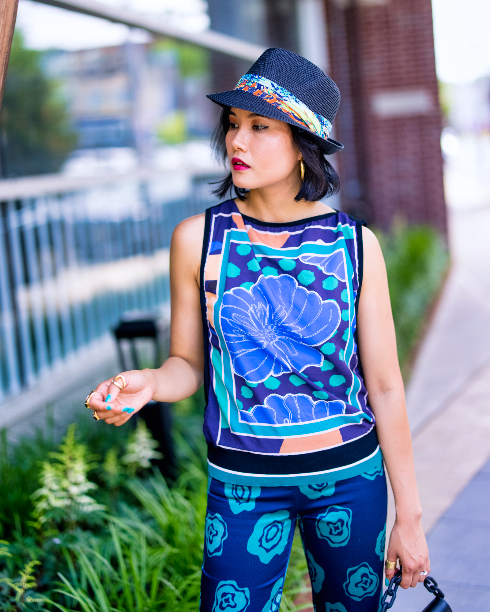 nanphanita jacob is strolling in nyc with women's ultra braid fedora with tri fold novelty print band by san diego hat company